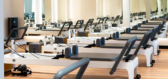 Housed Sydney reformer pilates and gym membership combo offering professional pilates studio with reformer equipment and full gym access